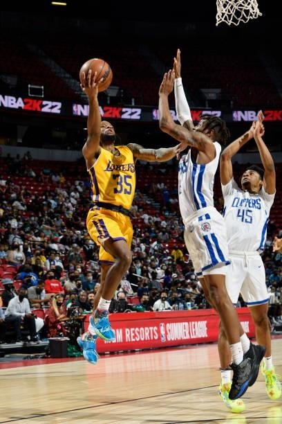 Zavier Simpson of the Los Angeles Lakers drives to the basket during the game against the LA Clippers during the 2021 Las Vegas Summer League on...