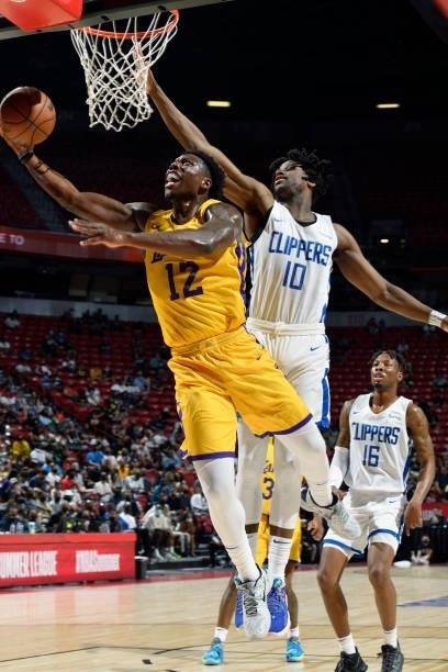 Devontae Cacok of the Los Angeles Lakers drives to the basket during the game against the LA Clippers during the 2021 Las Vegas Summer League on...