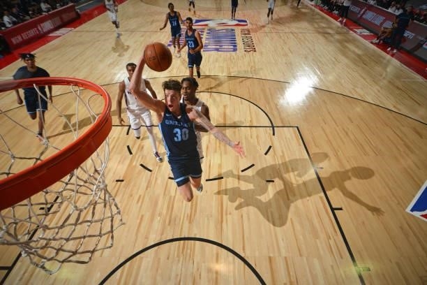 Sean McDermott of the Memphis Grizzlies dunks the ball against the Sacramento Kings during the 2021 Las Vegas Summer League on August 13, 2021 at the...