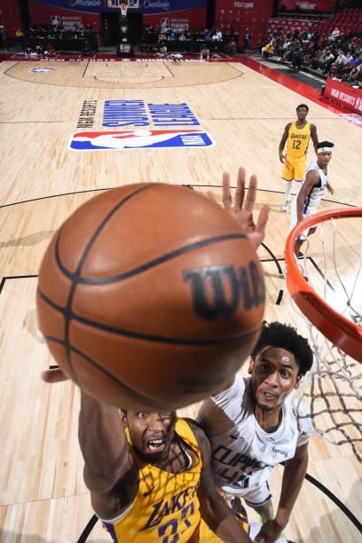 Keon Johnson of the LA Clippers plays defense on Vic Law of the Los Angeles Lakers during the 2021 Las Vegas Summer League on August 13, 2021 at the...