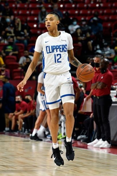Brandon Boston Jr. #12 of the LA Clippers dribbles the ball during the game against the Los Angeles Lakers during the 2021 Las Vegas Summer League on...