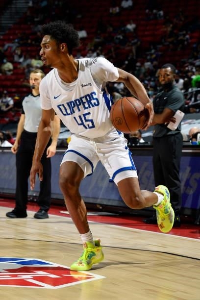 Keon Johnson of the LA Clippers dribbles the ball during the game against the Los Angeles Lakers during the 2021 Las Vegas Summer League on August...