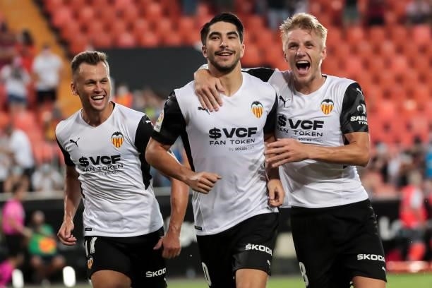 Carlos Soler of Valencia CF celebrate after scoring the 1-0 goal with his teammate Daniel Wass of Valencia CF during La liga match between Valencia...