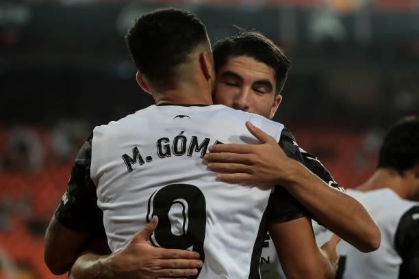 Carlos Soler of Valencia CF celebrate after scoring the 1-0 goal with his teammate Maxi Gomez of Valencia CF during La liga match between Valencia CF...