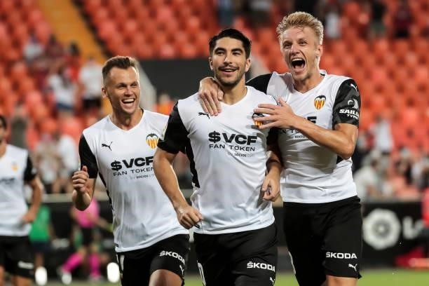 Carlos Soler of Valencia CF celebrate after scoring the 1-0 goal with his teammate Daniel Wass of Valencia CF during La liga match between Valencia...