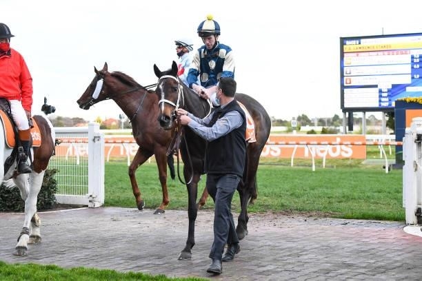 Sierra Sue ridden by John Allen returns to the mounting yard after winning the P.B. Lawrence Stakes at Caulfield Racecourse on August 14, 2021 in...