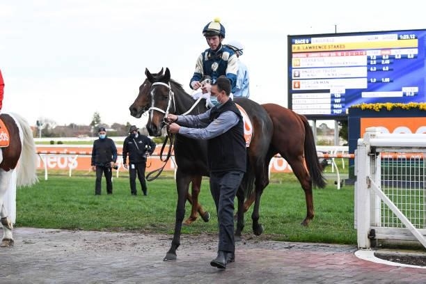 Sierra Sue ridden by John Allen returns to the mounting yard after winning the P.B. Lawrence Stakes at Caulfield Racecourse on August 14, 2021 in...