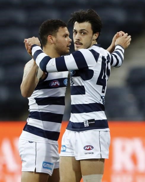 Brad Close of the Cats celebrates a goal with Brandan Parfitt of the Cats during the 2021 AFL Round 22 match between the Geelong Cats and the St...