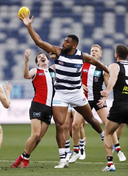 Esava Ratugolea of the Cats and Daniel McKenzie of the Saints compete for the ball during the 2021 AFL Round 22 match between the Geelong Cats and...