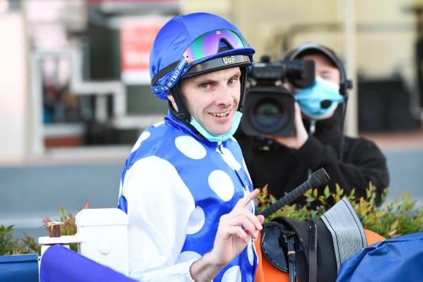 Declan Bates returns to the mounting yard after winning the Evergreen Turf Regal Roller Stakes at Caulfield Racecourse on August 14, 2021 in...