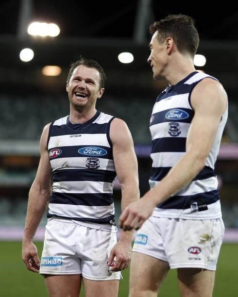 Patrick Dangerfield of the Cats celebrates with Jeremy Cameron during the 2021 AFL Round 22 match between the Geelong Cats and the St Kilda Saints at...