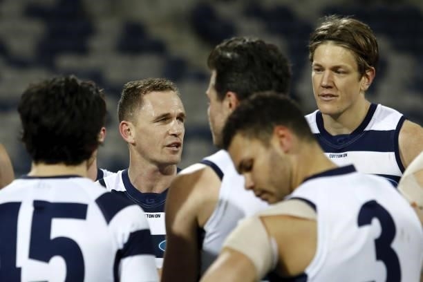 Joel Selwood of the Cats addresses his teammates after a win during the 2021 AFL Round 22 match between the Geelong Cats and the St Kilda Saints at...