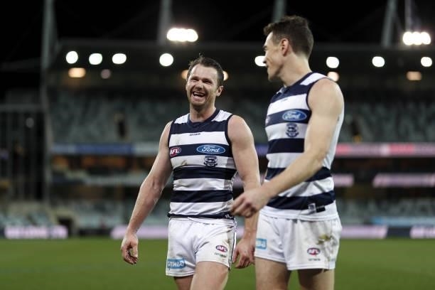Patrick Dangerfield of the Cats celebrates with Jeremy Cameron during the 2021 AFL Round 22 match between the Geelong Cats and the St Kilda Saints at...