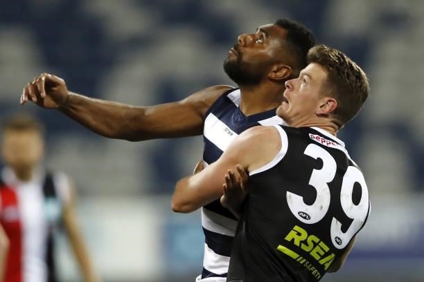 Esava Ratugolea of the Cats and Darragh Joyce of the Saints compete for the ball during the 2021 AFL Round 22 match between the Geelong Cats and the...