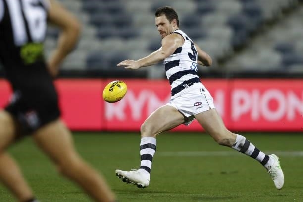 Patrick Dangerfield of the Cats kicks the ball during the 2021 AFL Round 22 match between the Geelong Cats and the St Kilda Saints at GMHBA Stadium...