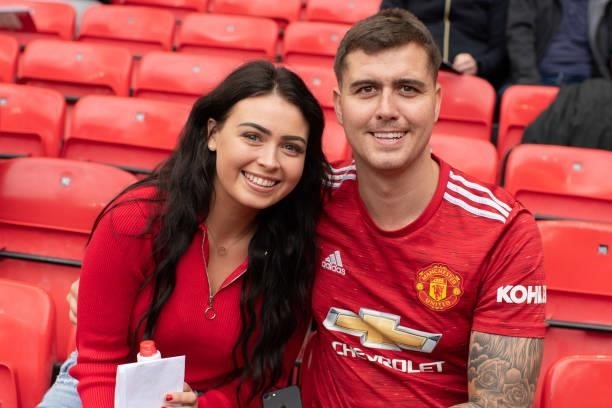 Manchester United fans show their support prior to the Premier League match between Manchester United and Leeds United at Old Trafford on August 14,...