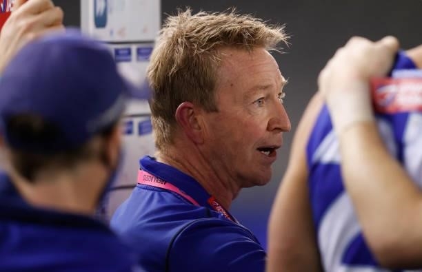 Senior coach David Noble of the Kangaroos addresses his players during the 2021 AFL Round 22 match between the North Melbourne Kangaroos and the...