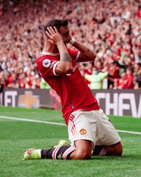 Bruno Fernandes of Manchester United celebrates scoring a goal to make the score 1-0 during the Premier League match between Manchester United and...