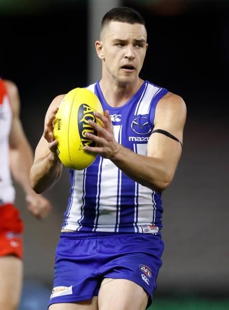 Luke Davies-Uniacke of the Kangaroos in action during the 2021 AFL Round 22 match between the North Melbourne Kangaroos and the Sydney Swans at...