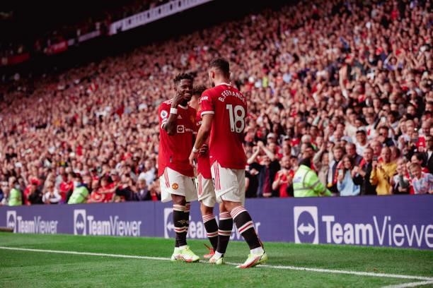 Bruno Fernandes of Manchester United celebrates scoring a goal to make the score 1-0 with Fred during the Premier League match between Manchester...