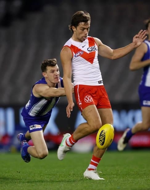 Oliver Florent of the Swans kicks a goal during the 2021 AFL Round 22 match between the North Melbourne Kangaroos and the Sydney Swans at Marvel...