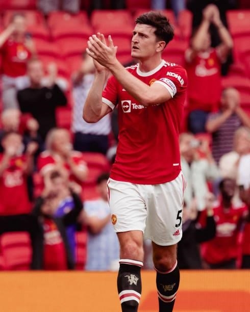 Harry Maguire of Manchester United applauds the fans during the Premier League match between Manchester United and Leeds United at Old Trafford on...
