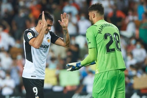 Maxi Gomez of FC Valencia and Giorgi Mamardashvili of FC Valencia celebrates during the La Liga Santader match between Valencia CF and Getafe CF at...