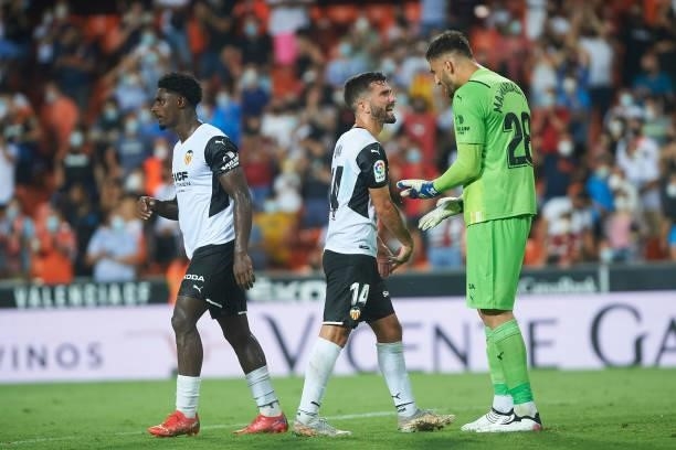 Jose Luis Gaya of FC Valencia and Giorgi Mamardashvili of FC Valencia celebrates during the La Liga Santader match between Valencia CF and Getafe CF...