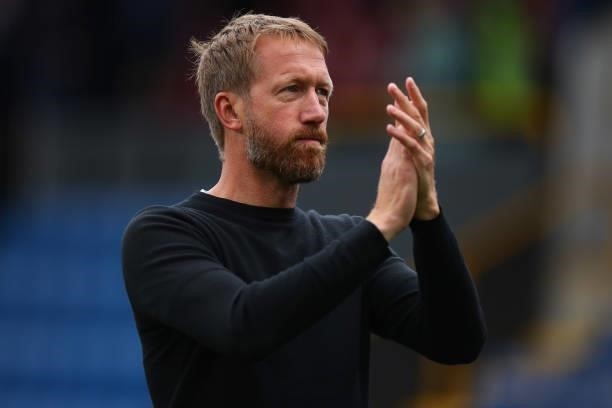 Graham Potter the heas coach of Brighton and Hove Albion applauds during the Premier League match between Burnley and Brighton & Hove Albion at Turf...