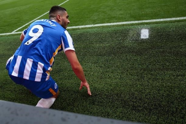 Neil Maupay of Brighton and Hove Albion reacts after being pushed in to the LED boards during the Premier League match between Burnley and Brighton &...