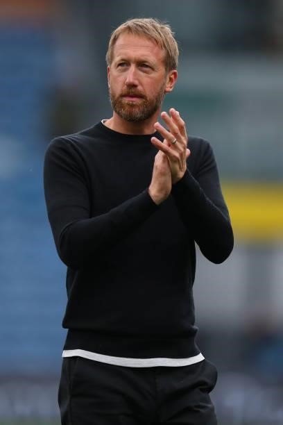 Graham Potter the heas coach of Brighton and Hove Albion applauds during the Premier League match between Burnley and Brighton & Hove Albion at Turf...