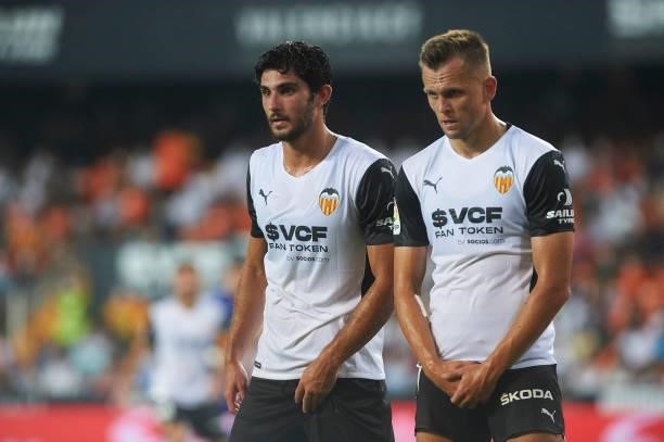 Gonzalo Guedes of FC Valencia and Denis Cheryshev of FC Valencia looks on during the La Liga Santader match between Valencia CF and Getafe CF at...