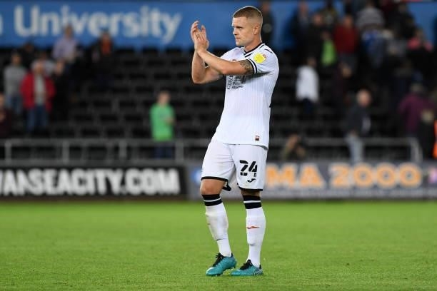 Jake Bidwell of Swansea City applauds the fans at the final whistle during the Sky Bet Championship match between Swansea City and Sheffield United...