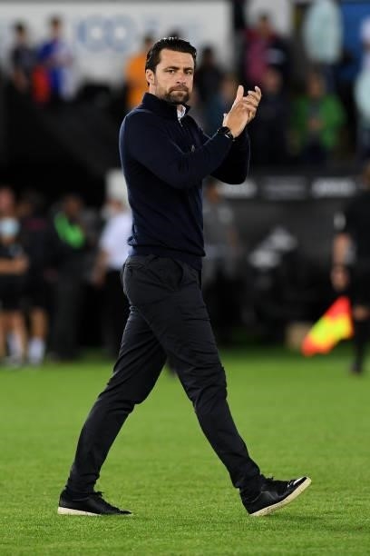 Russell Martin Head Coach of Swansea City applauds the fans at the final whistle during the Sky Bet Championship match between Swansea City and...