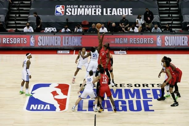 The Toronto Raptors and the Golden State Warriors tip off during the 2021 Las Vegas Summer League on August 11, 2021 at the Thomas & Mack Center in...