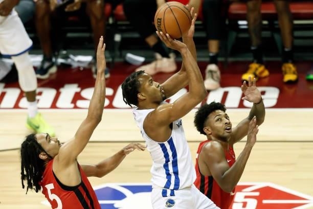 Moses Moody of the Golden State Warriors drives to the basket against the Toronto Raptors during the 2021 Las Vegas Summer League on August 11, 2021...