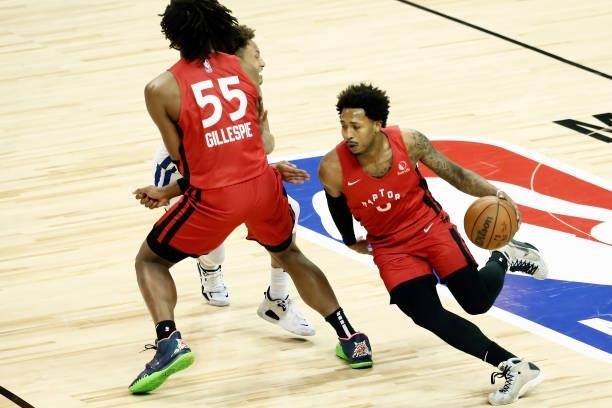 Jalen Adams of the Toronto Raptors dribbles the ball against the Golden State Warriors during the 2021 Las Vegas Summer League on August 11, 2021 at...
