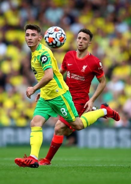 Billy Gilmour of Norwich City in action with Diogo Jota of Liverpool during the Premier League match between Norwich City and Liverpool at Carrow...