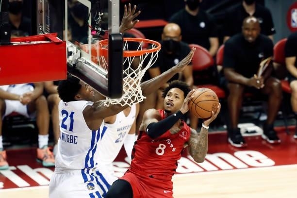 Jalen Adams of the Toronto Raptors drives to the basket against the Golden State Warriors during the 2021 Las Vegas Summer League on August 11, 2021...