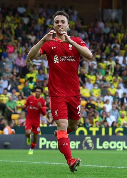Diogo Jota of Liverpool celebrates scoring the opening goal during the Premier League match between Norwich City and Liverpool at Carrow Road on...