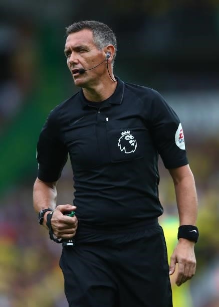 Referee Andre Marriner during the Premier League match between Norwich City and Liverpool at Carrow Road on August 14, 2021 in Norwich, England.