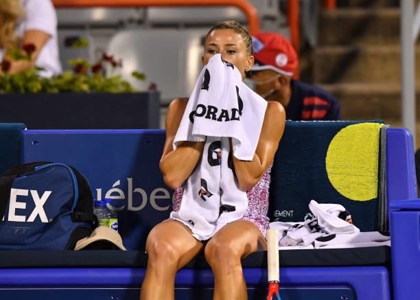Camila Giorgi of Italy wipes herself down in between play during her Women's Singles Semifinals match against Jessica Pegula of the United States on...