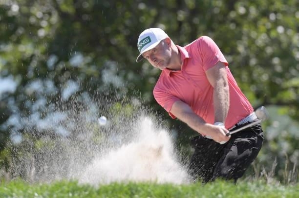 David Skinns plays a bunker shot on the fifth hole during the third round of the Korn Ferry Tours Pinnacle Bank Championship presented by Aetna at...