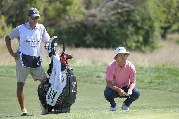Zecheng Dou watches play on the fifth hole during the third round of the Korn Ferry Tours Pinnacle Bank Championship presented by Aetna at The Club...