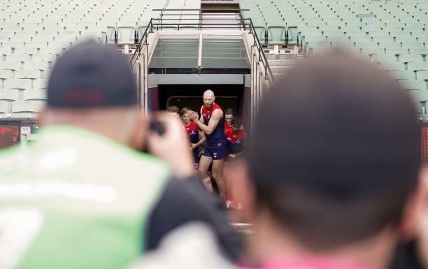 Max Gawn of the Demons walks up the race during the 2021 AFL Round 22 match between the Melbourne Demons and the Adelaide Crows at the Melbourne...