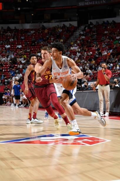Quentin Grimes of the New York Knicks dribbles the ball against the Cleveland Cavaliers during the 2021 Las Vegas Summer League on August 14, 2021 at...