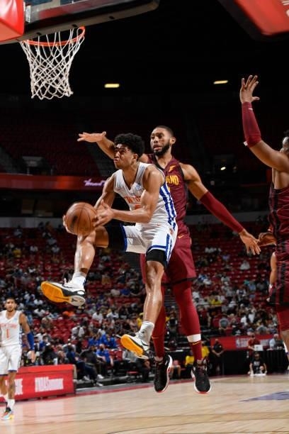 Quentin Grimes of the New York Knicks drives to the basket against the Cleveland Cavaliers during the 2021 Las Vegas Summer League on August 14, 2021...