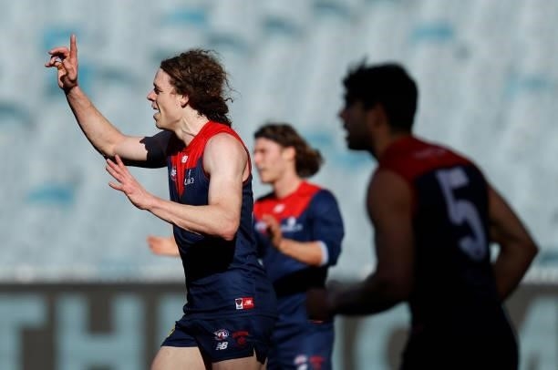 Ben Brown of the Demons celebrates a goal during the 2021 AFL Round 22 match between the Melbourne Demons and the Adelaide Crows at the Melbourne...