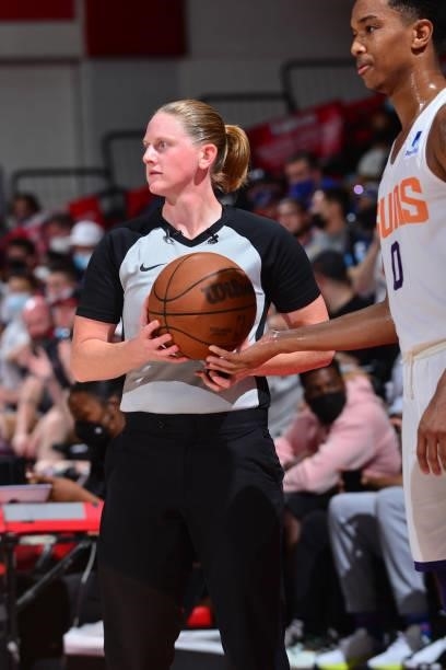Referee, Kelsey Reynolds hands a player the ball during the game between the Portland Trail Blazers and the Phoenix Suns during the 2021 Las Vegas...