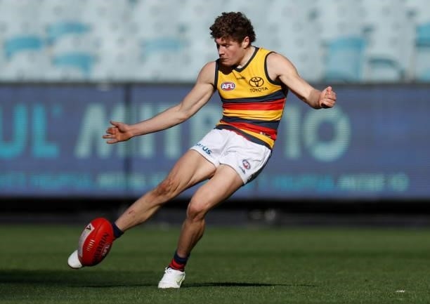 Harry Schoenberg of the Crows in action during the 2021 AFL Round 22 match between the Melbourne Demons and the Adelaide Crows at the Melbourne...